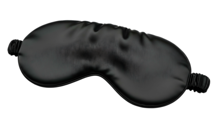 Smooth black eye covering rests diagonally against a solid dark background