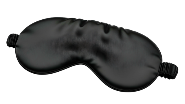 Smooth black eye covering rests diagonally against a solid dark background