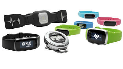 Fototapeta premium Assortment of fitness tracking gadgets and personal health monitors displayed against a dark background