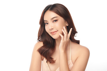 A beautiful young Asian woman with clean, fresh skin against a white background. Skincare, facial treatment, cosmetology, beauty, and spa. An elegant portrait of an Asian woman.