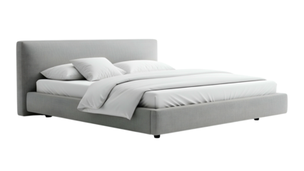 Modern upholstered platform bed setup featuring crisp white linens against a dark background