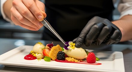 Chef plating dessert with flower garnish culinary art food styling gourmet presentation fine dining detail