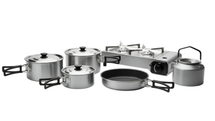 Group of stainless steel outdoor cooking implements and portable burner displayed against a solid black background