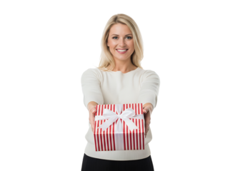 Joyful blonde woman offers a festive red and white striped gift with a white bow, conveying warmth and holiday cheer for greeting cards and promotions