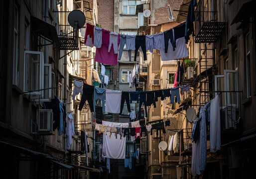 Laundry hanging between buildings