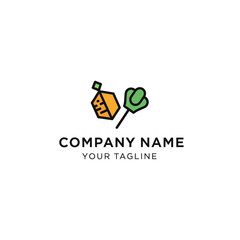 Eco friendly home and garden logo concept with carrot and tree.