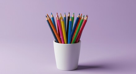 Assortment of sharpened color drawing implements stand upright within a white holder against a solid background.