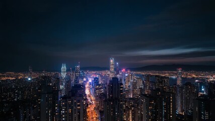 A seamless loopable time lapse of city lights illuminating at dusk, showing buildings, traffic glow, and an urban skyline transitioning from day to night.