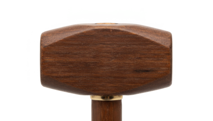 Close-Up of a Decorative Wooden Scepter Head With Geometric Design