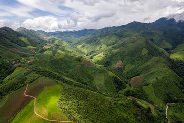 Landscape of Morning Mist with Mountain Layer at north of Thailand. mountain ridge and clouds in...