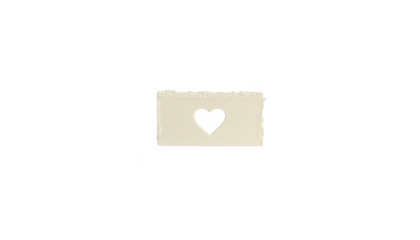 Torn Beige Paper With Heart Cutout on White Backdrop