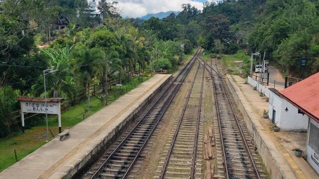 Deserted railway tracks at Ella Station, nestled amid lush tropical greenery along Sri Lanka&rsquo;s scenic Badulla&ndash;Colombo line, a peaceful moment on one of the world&rsquo;s most beautiful train routes