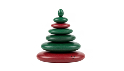 Stack of Red and Green Zen Stones With Smiley Face on White Background