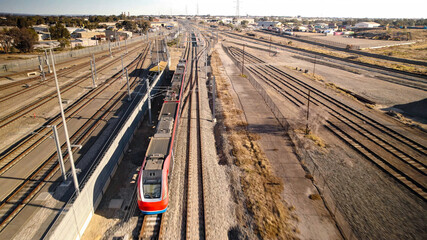 Train station with high-speed train carriages