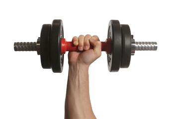 Hand holding a heavy dumbbell with weight plates on white background Keywords: hand, holding