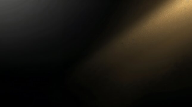 Golden light beam shining from the top right corner on a dark background