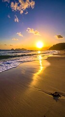 A vibrant sunset paints the sky and shore with warm hues, as gentle waves roll onto a sandy beach, reflecting the golden light