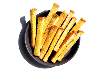 Sweet, sugar-coated crispy toast sticks.