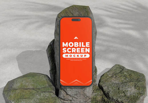 Mobile Phone Screen Mockup Resting on Natural Rock or Stone Element
