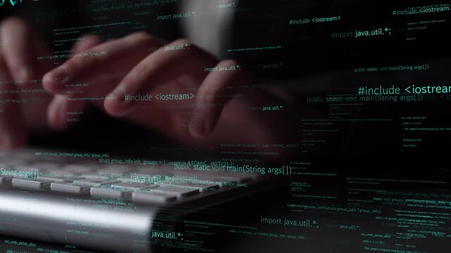 Close-up of hands typing on a laptop keyboard with glowing programming code overlayed on the screen, representing modern technology and software development in action. Xenic