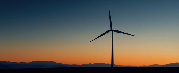 The Wind Turbine Standing Against Colorful Sunset Sky Over Rolling Hills