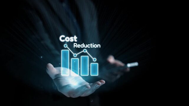 A pair of hands holding a glowing digital interface featuring graphs and icons representing cost reduction and business efficiency strategies in a modern setting. Qubit