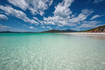 Turquoise Clear Water Beach With White Sand And Blue Sky