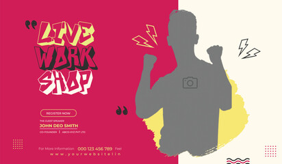 Man in suit posing next to vibrant event flyer