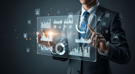 A businessman in a suit interacts with a futuristic digital interface, showcasing data analysis and innovative technology.