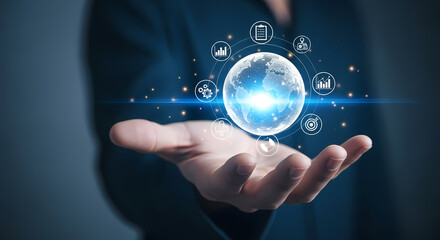 A person's outstretched hand cradles a glowing digital globe, symbolizing global connectivity and technological advancements in the modern era.