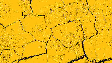 Vibrant yellow cracked paint creates an abstract texture perfect for backgrounds and design elements