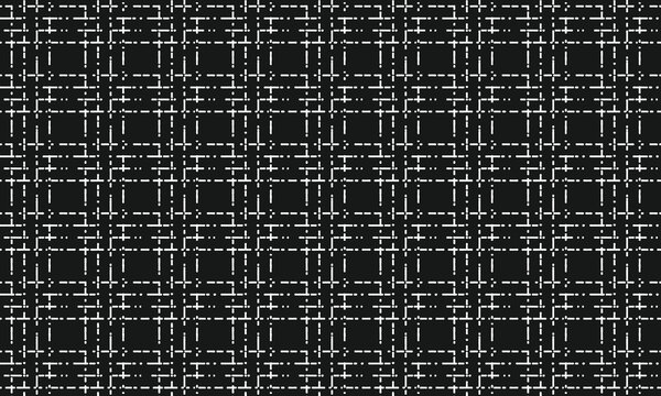 白の破線が四角い格子柄になって並ぶ黒いツイード生地のパターン