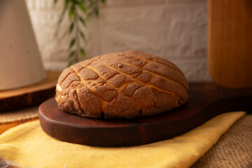 Concha bread. Mexican sweet bread roll with seashell-like appearance, Usually eaten with coffee or hot chocolate at breakfast or as an afternoon snack.