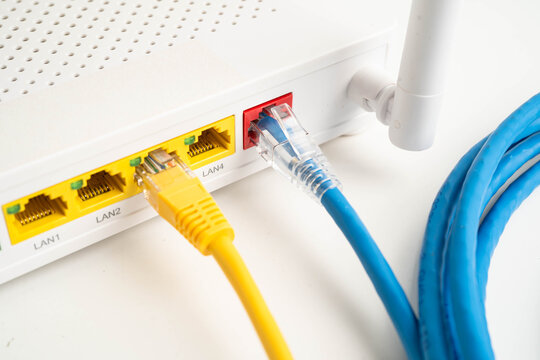Ethernet cable with wireless router connect to internet service provider network.