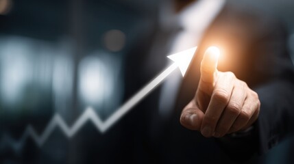 Businessman touches glowing upward arrow indicating growth and success.