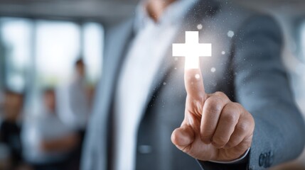 Businessman finger touches glowing white cross icon with sparkling particles.