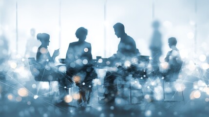 Silhouettes of business people meeting overlaid with digital network graphic.