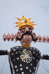Ravnans being ignited during Dussehra festival at ramleela ground in Delhi, India, Big statue of Ravana to get fire during the Fair of Dussera to celebrate the victory of truth by Lord Rama
