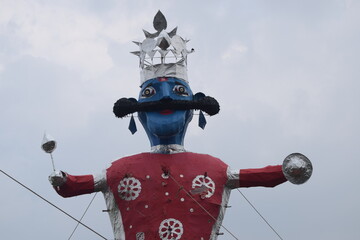 Ravnans being ignited during Dussehra festival at ramleela ground in Delhi, India, Big statue of Ravana to get fire during the Fair of Dussera to celebrate the victory of truth by Lord Rama
