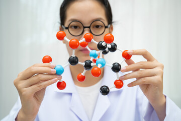 Molecules chemical on a periodic table background.