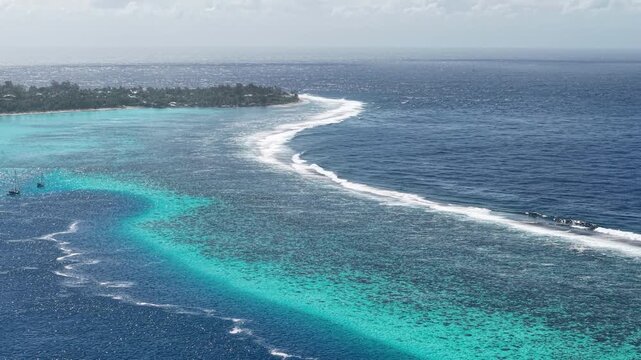 French Polynesia, Aerial View of Coral Reefs Barrier, Turquoise and Blue Water Around Island, Drone Shot