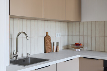 modern minimalist kitchen sink corner with wooden accents