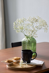 Tranquil still life showcasing morning treats and cozy decor