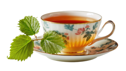 Hot herbal black tea in a white teacup with lemon and mint leaves on a saucer isolated object