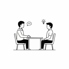 Two people having a conversation at a table discussing ideas.