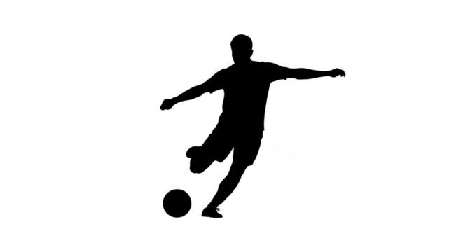 Soccer player silhouette kicks the ball