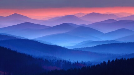 Obraz premium Mountains bathed in blue and purple hues, mist accumulating in valleys, calm and serene scenic nature view