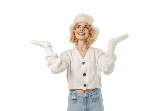 Fototapeta Woman wearing warm winter clothes smiles cheerfully, isolated, PNG