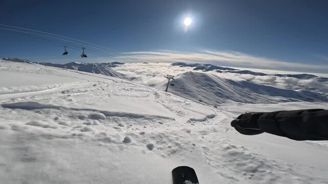 Snowboarder in freeride, Gudauri ski resort, Georgia