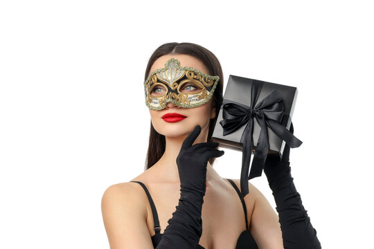 Chic woman in mask poses with gift box, isolated, PNG
